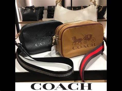 coach crossbody with thick strap.